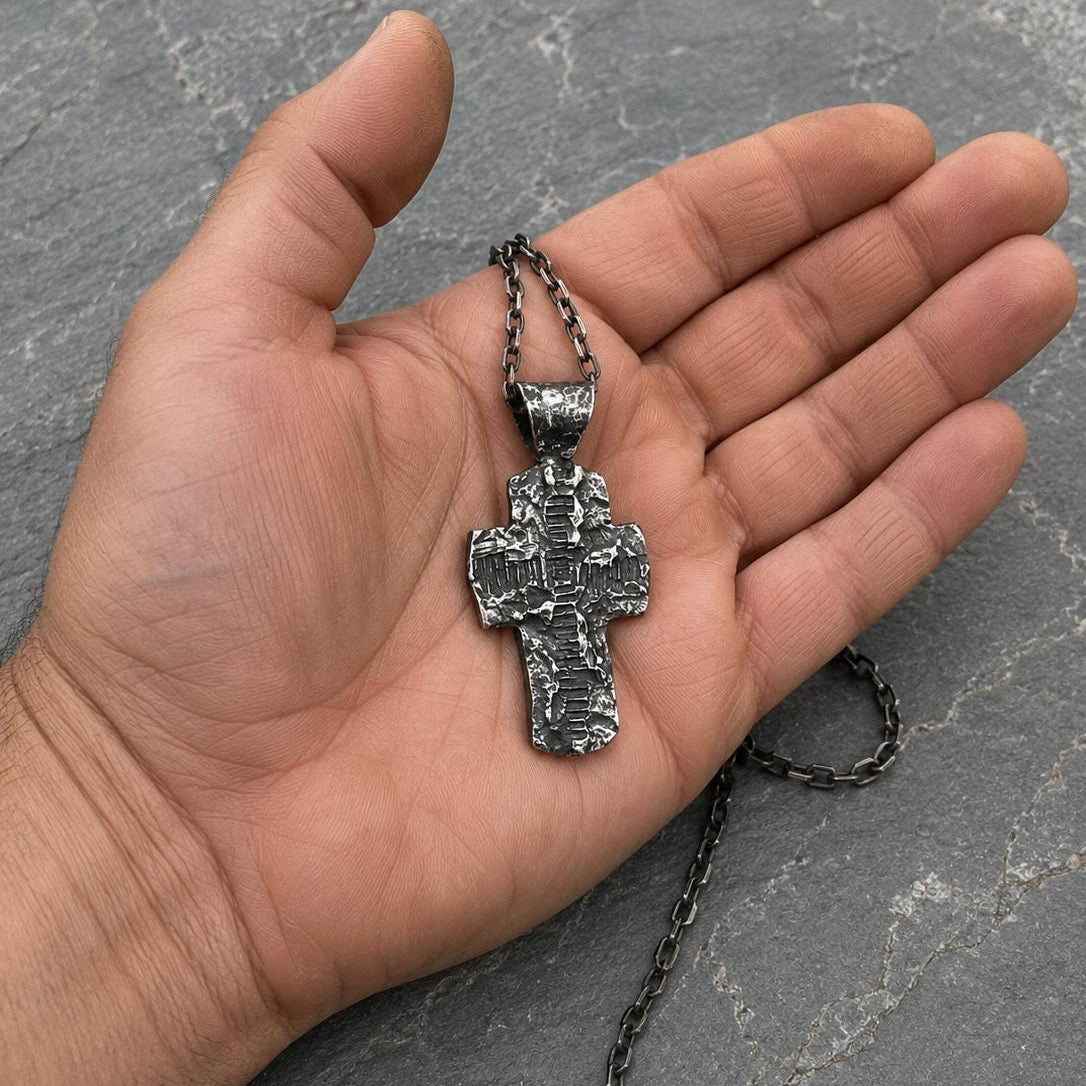 Hammered Christian Cross necklace by JJewelryArt, featuring a textured metal cross pendant on a chain.