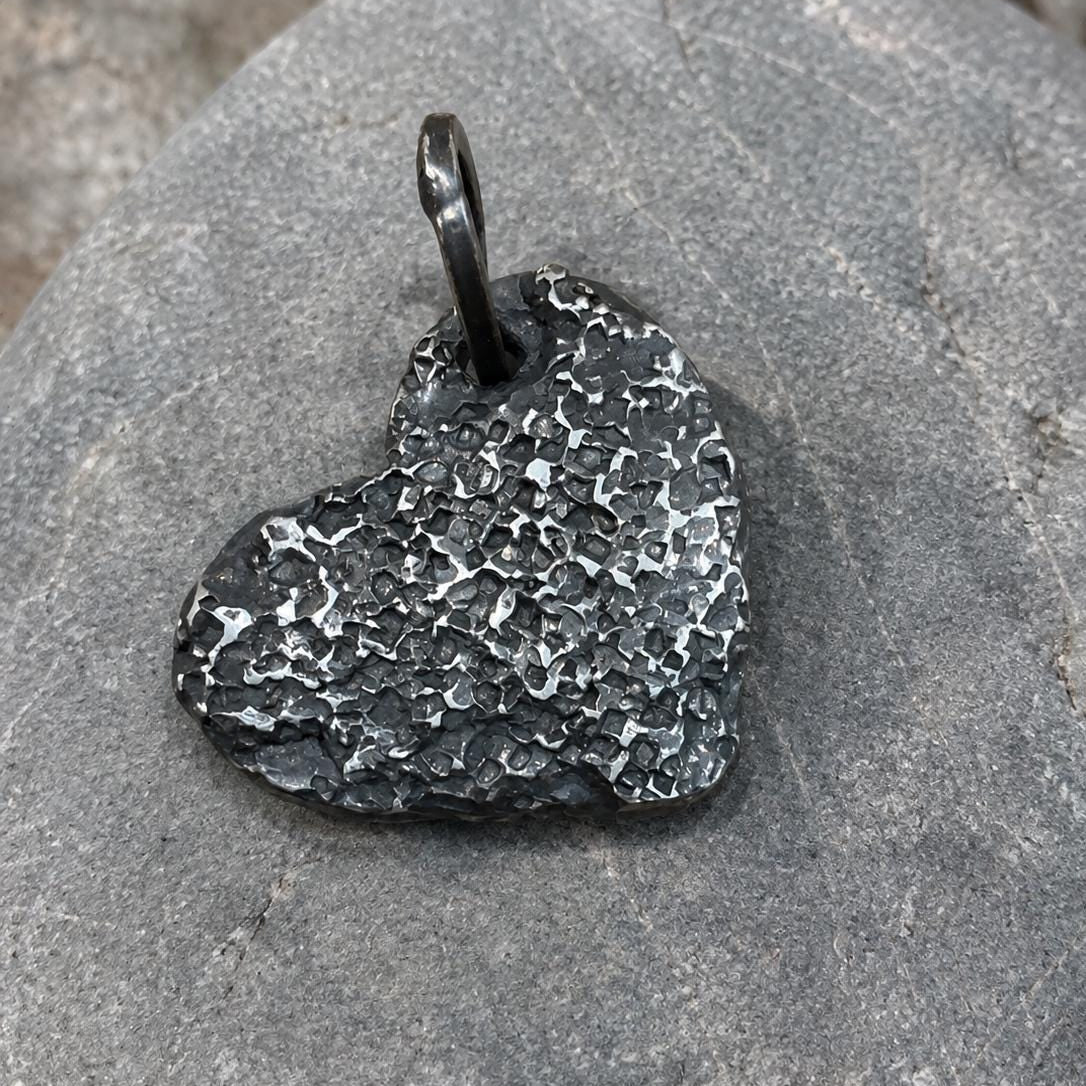 Oxidized silver heart pendant by JJewelryArt, featuring a detailed heart-shaped design on a silver chain.