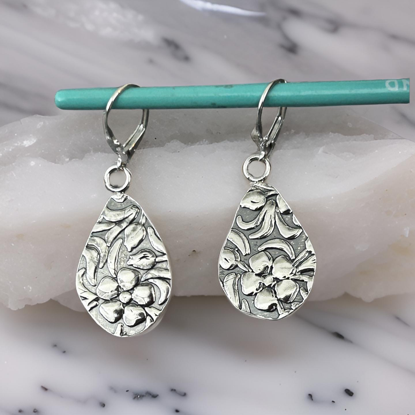 sterling silver floral design earrings