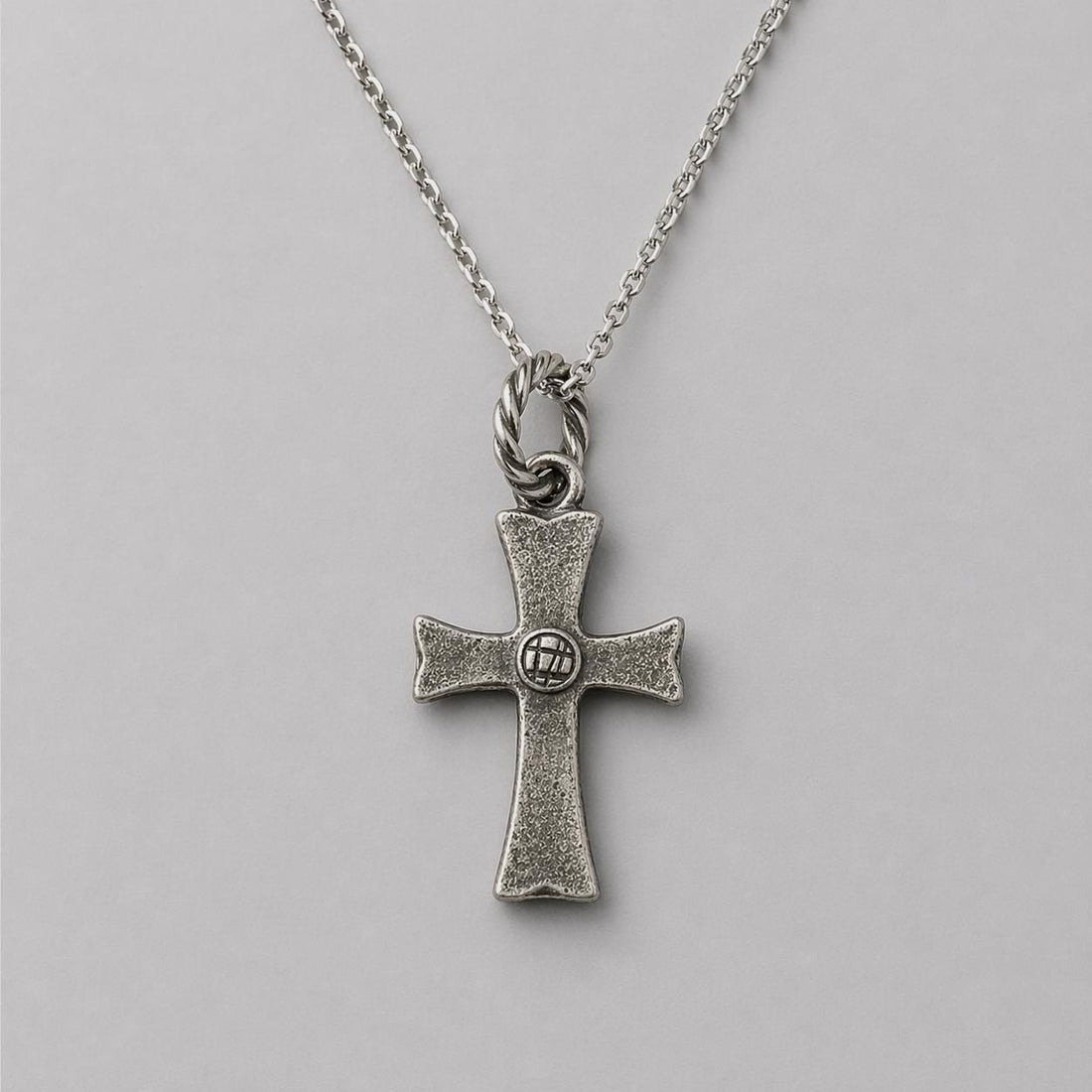 Rustic Gothic textured cross pendant with detailed design, crafted by JJewelryArt, displayed on a neutral background.