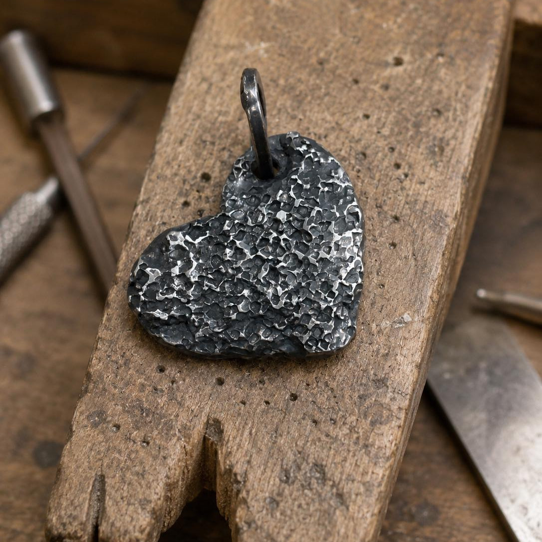 Oxidized silver heart pendant by JJewelryArt featuring a detailed heart-shaped design on a silver chain.