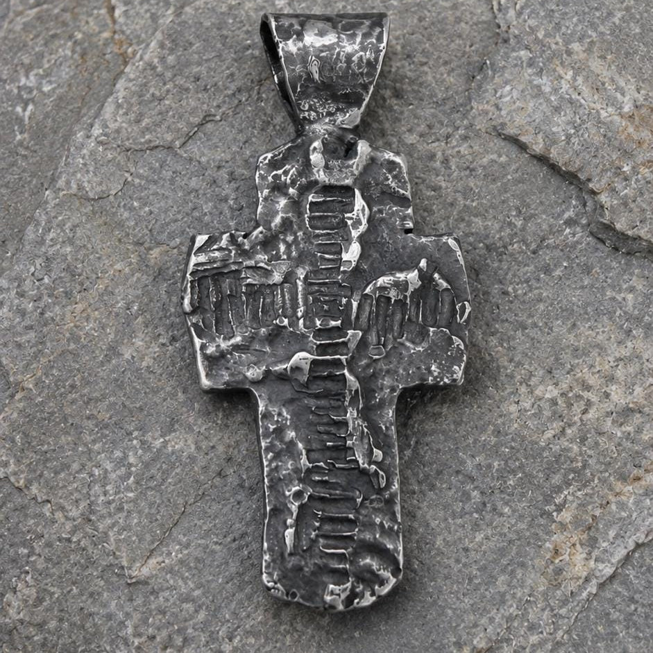 Hammered Christian cross necklace by JJewelryArt featuring a textured metal pendant on a chain, suitable for religious or casual wear.