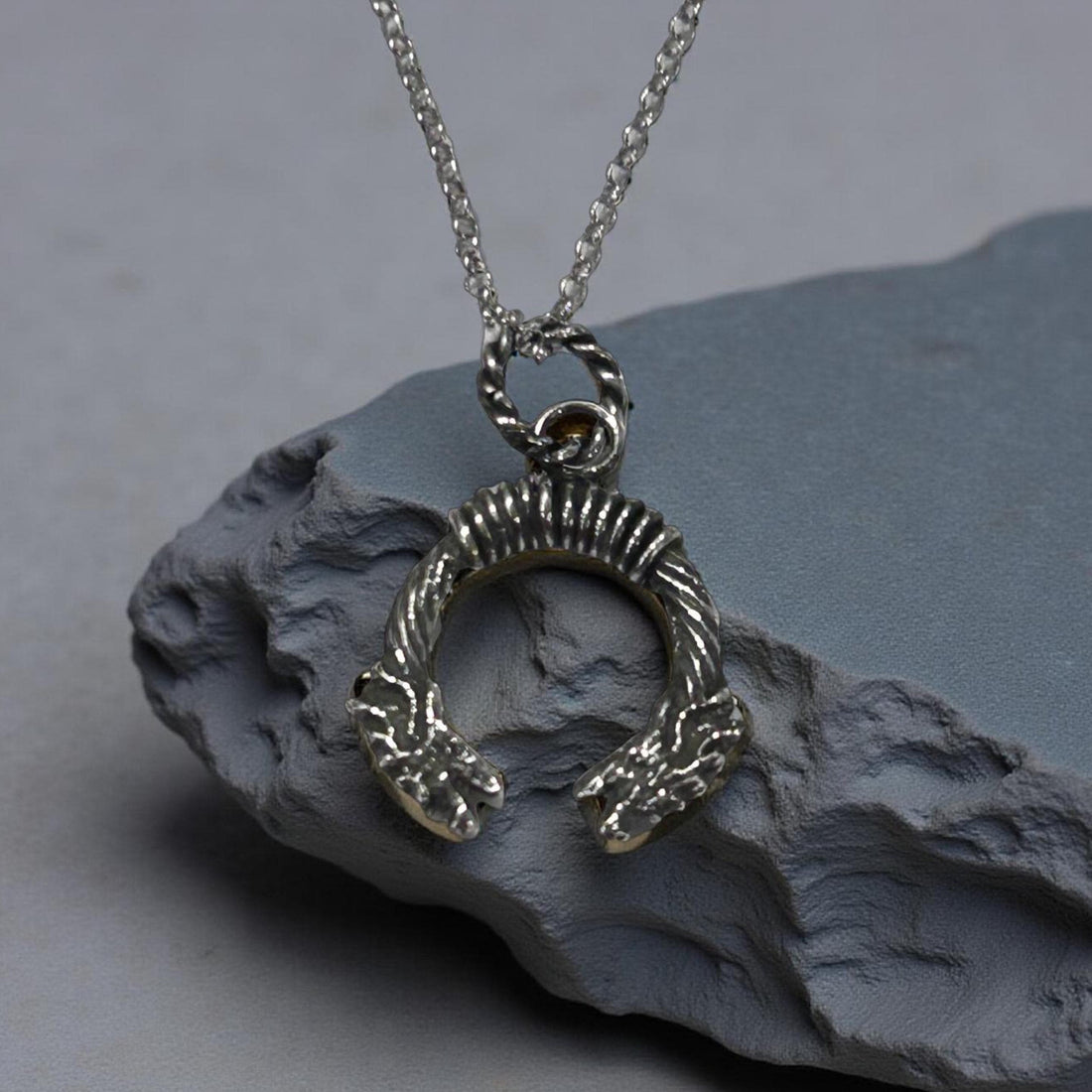 Oxidized silver dragon pendant from JJewelryArt featuring Nordic-inspired design and intricate detailing.