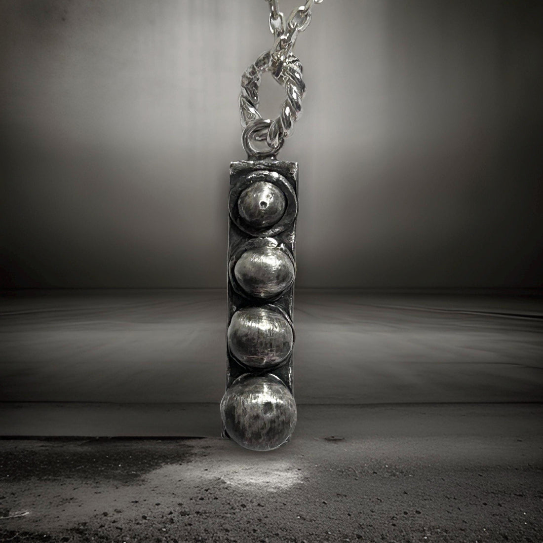Silver celestial orbit pendant by JJewelryArt featuring a spherical design with intricate planetary details.