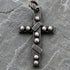 Silver artisan pendant featuring a rustic cross design with intricate detailing, crafted by JJewelryArt.
