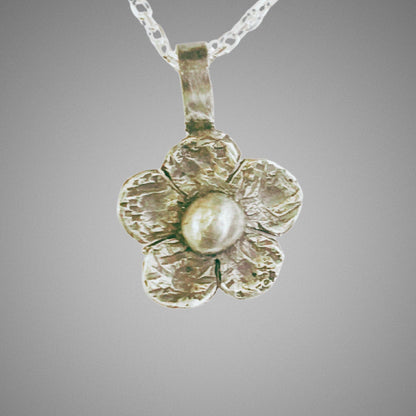 Flower Necklace handcrafted in sterling silver. with oxidized touch